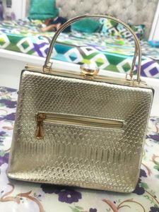 Elegant Beaded Silver Clutch