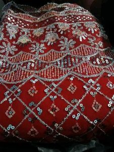 Red dress material with embroidery work
