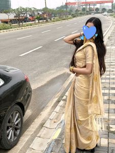 Elegant Beige Saree with Embellishments