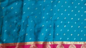Beautiful Teal Saree with Pink Border