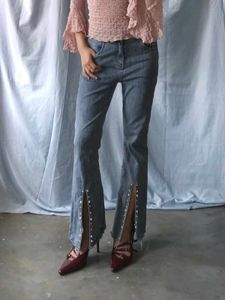 Flared Jeans with Studded Slits