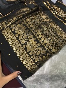 Elegant Black Saree with Gold Dots