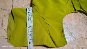 It's a Green coloured saree with blouse