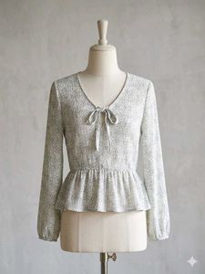 Chic Printed Peplum Blouse with Tie Neck