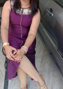 Elegant Purple Kurta Set with Embellished Neckline
