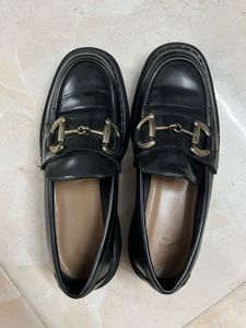 Classic Black Loafers with Gold Buckle