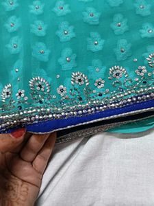 Stunning Teal Saree with Embellished Blouse
