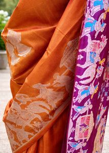 Stunning Orange Silk Saree with Purple Border