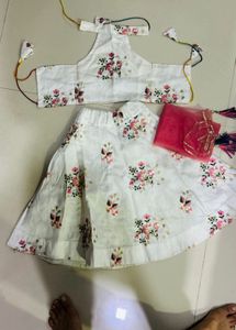 Elegant White Lehenga Choli with Pink Floral Embro