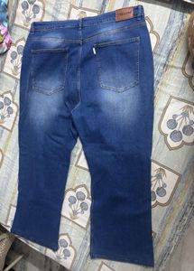 Distressed Blue Denim Jeans