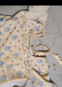 Elegant Cream Kurta with Blue Floral Print