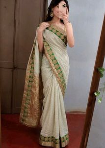 Grand Cream Saree with Green-Golden border