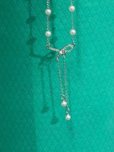 silver plated Elegant Pearl and Bow Necklace