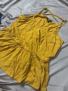 cute mustard sleeveless peplum top