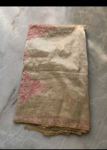 Elegant Golden Saree with Pink Embroidery