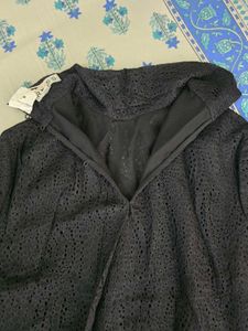 Elegant Black Textured Mock Neck Top