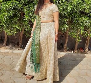Cream Colour Lehenga Choli With Green Dupatta