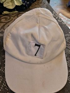White Baseball Cap with "7" Emblem