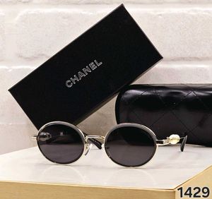 Chanel Round Sunglasses with Pearl Detail