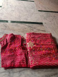 Stunning Bandhani Saree with Intricate Embellishme