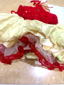 red  and beige colour frock