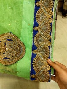 Elegant Green Saree with Embellishments