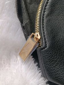 Carolina Herrera Black Clutch with Gold Lightning