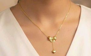 Gold Bow &amp; Heart Necklace