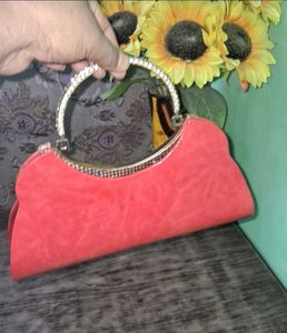 Elegant Coral Clutch Bag with Crystal Handle