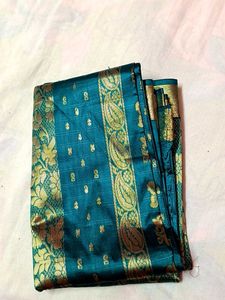 Elegant Teal Saree with Gold Paisley Border