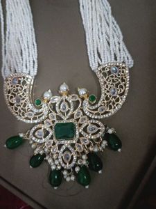 Elegant White pearl Necklace with Emerald Pendant