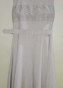 Elegant tunic with jacket and belt