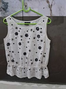 White Sleeveless Top with Floral Print