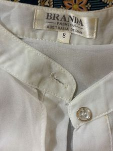 Sheer White Sleeveless Tunic Top