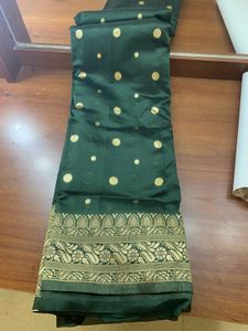 Elegant Dark Green Saree with Gold Polka Dots