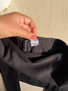 h n m black top with skirt