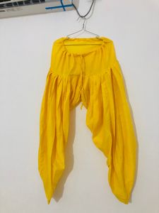 Elegant Yellow Kurti with Gold Embellishments