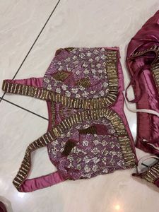 purple lengha with heavy blouse and dupatta