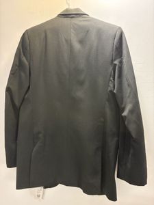 A Raymond Suit of rich dark greenish black colour