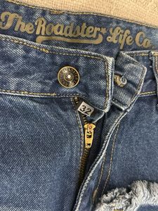 Distressed Mesh Panel Jeans