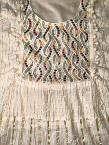 Embroidered Cream Kurta with Colorful Details
