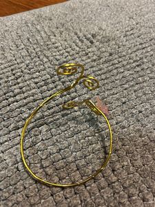 Gold Tone Arm Cuff with Flower Accent