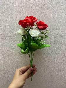 Artificial flowers Red and white with green leaves
