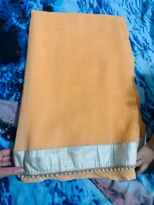 Peach Saree with Silver moti border