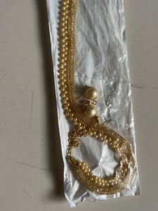 Elegant Gold and Pearl Necklace Set
