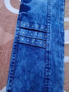 Stylish Blue Wash Jeans with Embellished Details