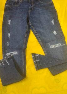 Distressed Blue Denim Jeans