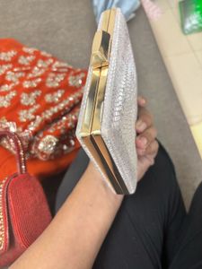 green saree with Clutch Bag