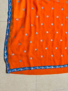 Vibrant Orange Saree with Blue Border