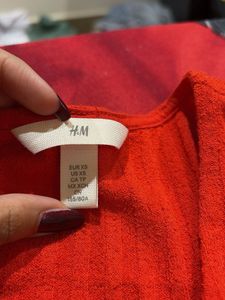 Red Ribbed V-Neck Button-Up Top
